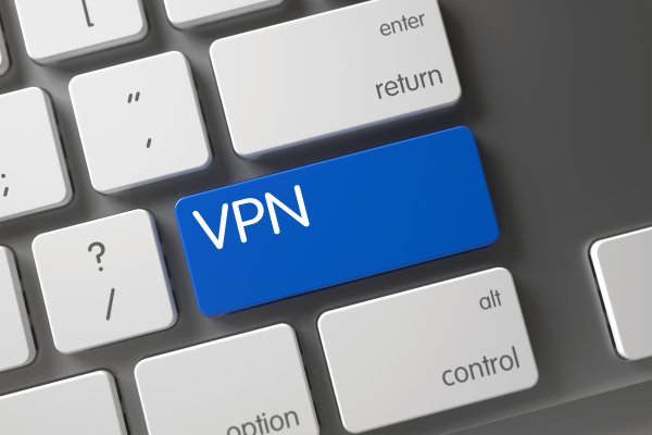 vpn nordvpn service free trial computer laptop keyboard blue VPN key